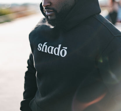 Shadō luminescent unisex black hoodie.