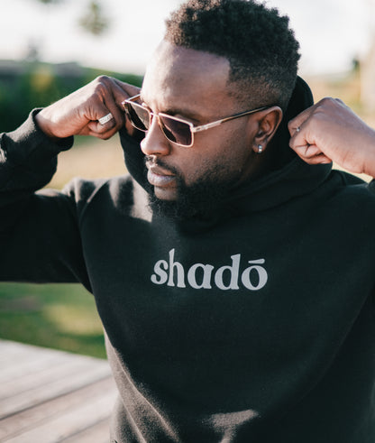 Shadō luminescent unisex black hoodie.
