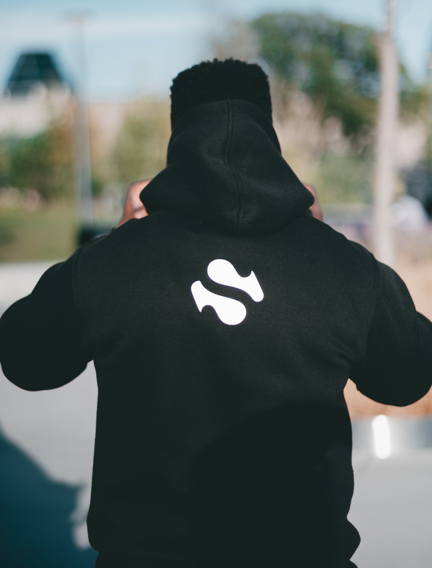 Shadō luminescent unisex black hoodie.